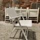 Five wooden garden armchairs