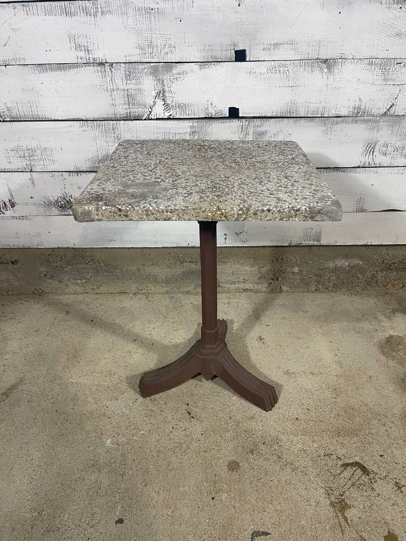 Bistro table with a cast iron base
