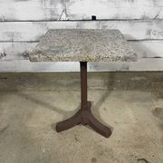 Bistro table with a cast iron base