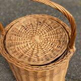 Round woven rattan and wicker umbrella holder with handle