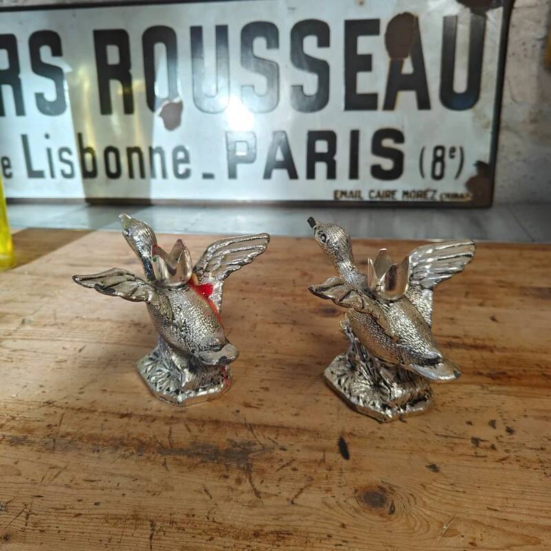 Set of two vintage silver-plated candle holders.