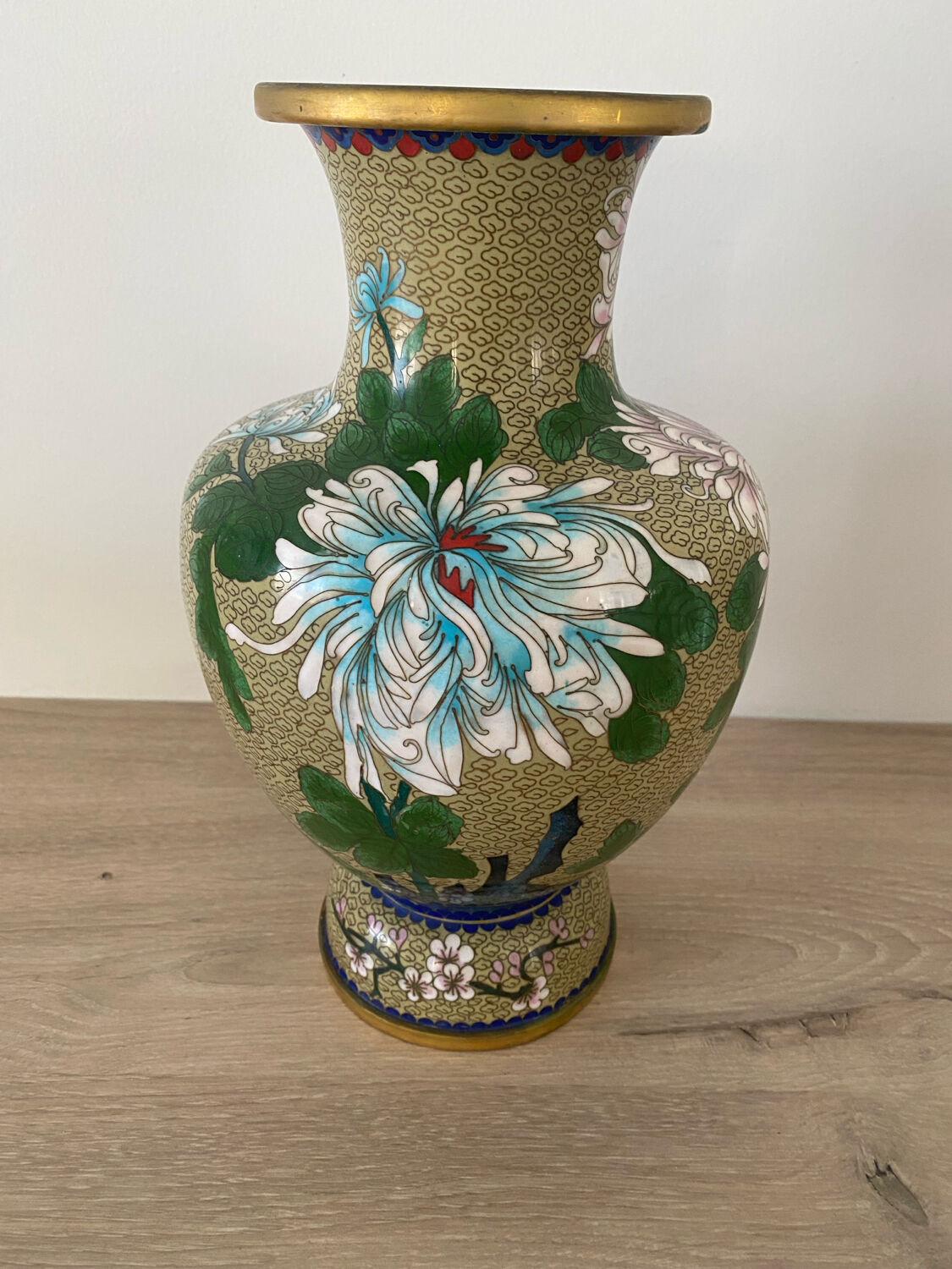 Chinese cloisonné vase decorated with flowers and butterflies.