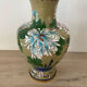 Chinese cloisonné vase decorated with flowers and butterflies.