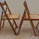 4 vintage varnished wooden folding chairs - Seats completely restored.