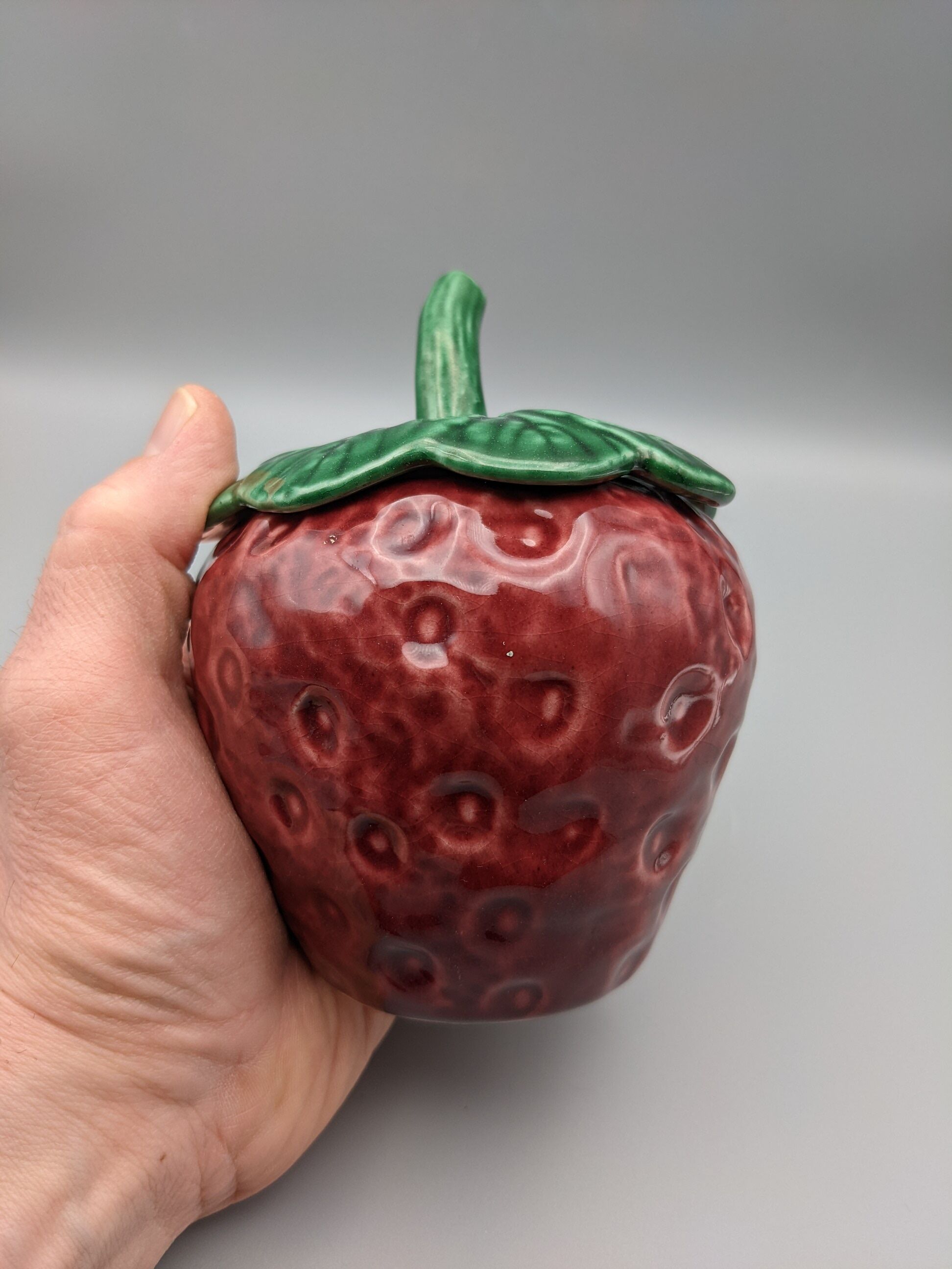 Condiment jar mustard jam in the shape of strawberry