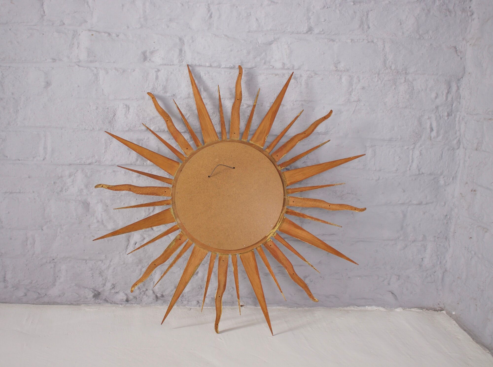 Sun mirror in gilded wood