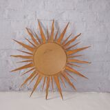 Sun mirror in gilded wood
