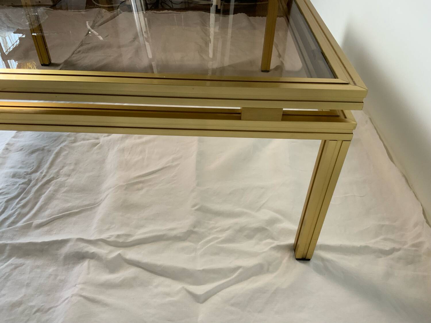 Glass and brass coffee table