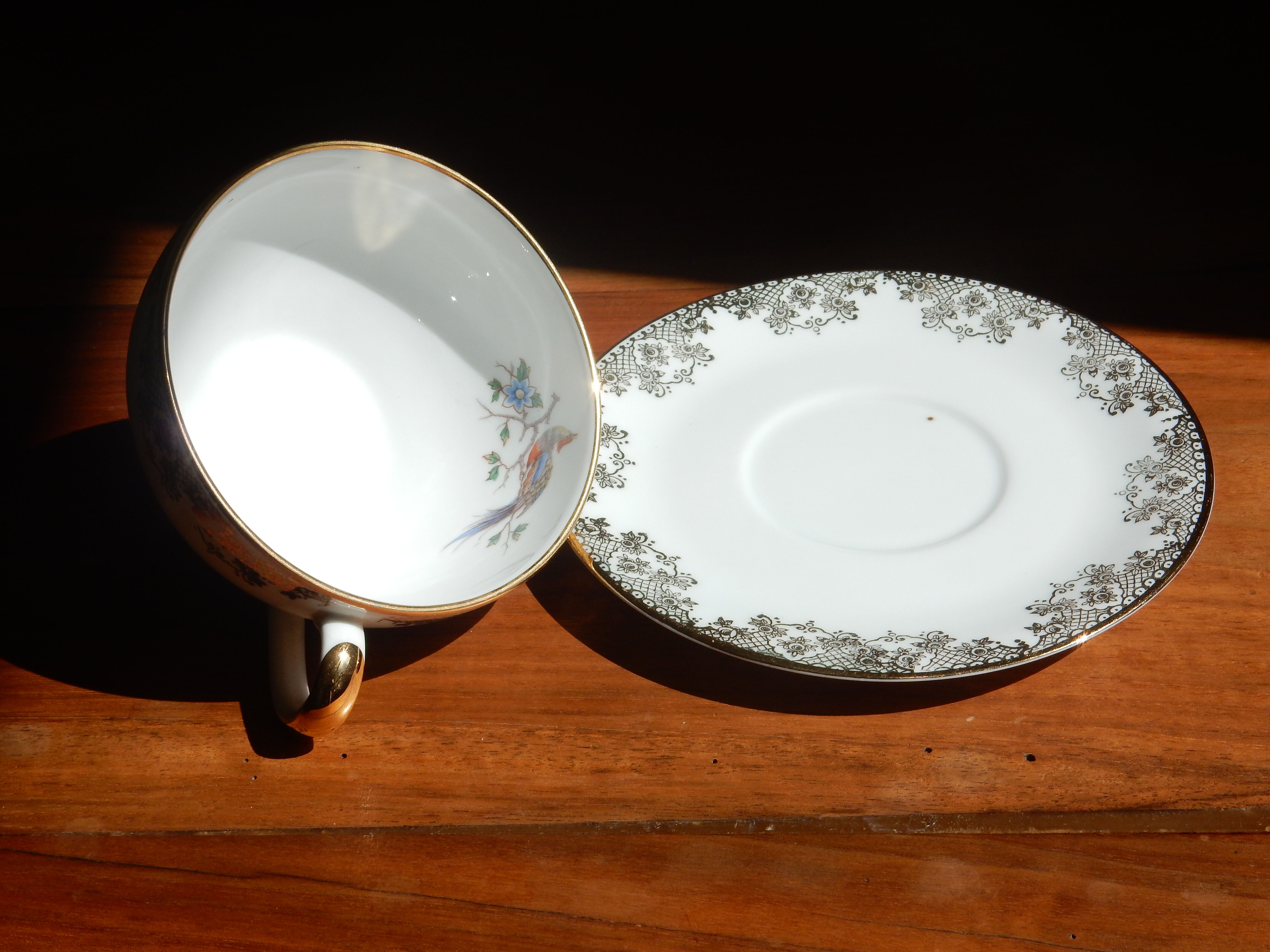 Charles Ahrenfeldt's teacup and subcup limoges