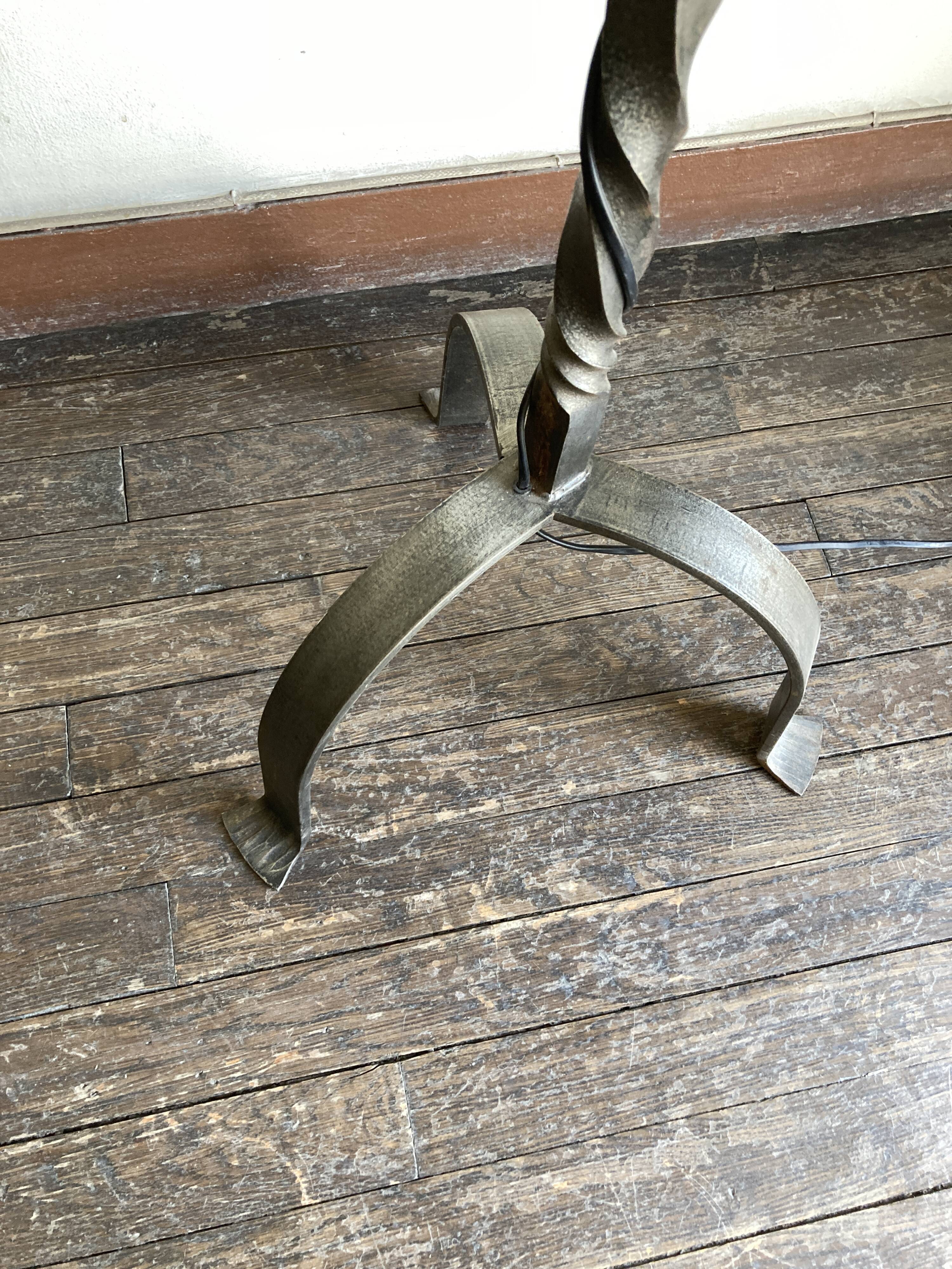 Floor lamp in beaten iron and bronze Artisans de Marolles 1960