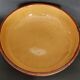 Glazed terracotta shallow dish from the 20th century.