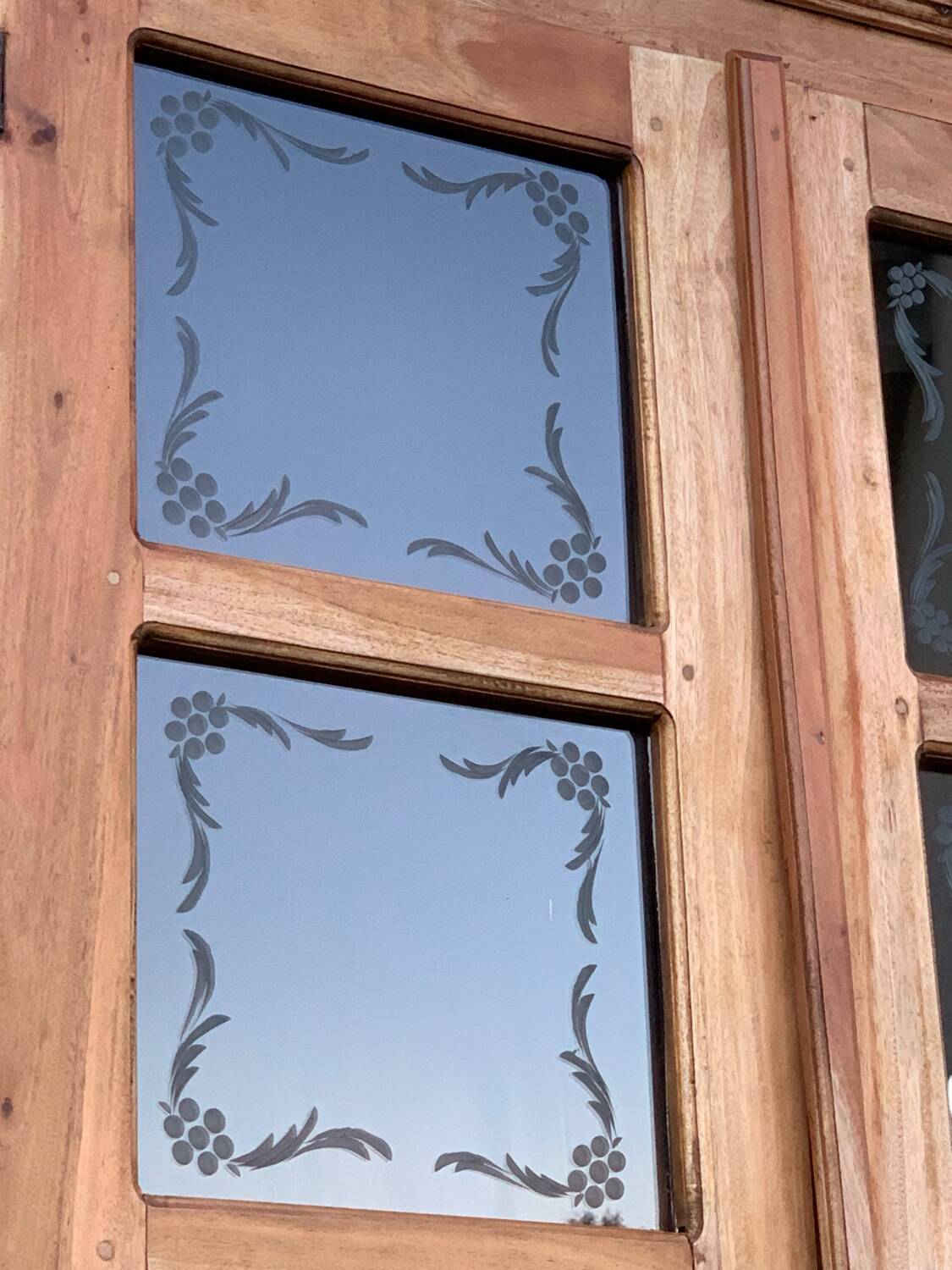 Parisian wardrobe in raw wood with engraved glass from 1920.