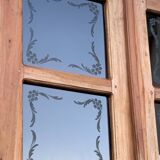 Parisian wardrobe in raw wood with engraved glass from 1920.