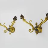 Paire d'appliques murales style Empire double feux en bronze