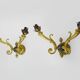 Pair of double-light Empire style wall lights in bronze