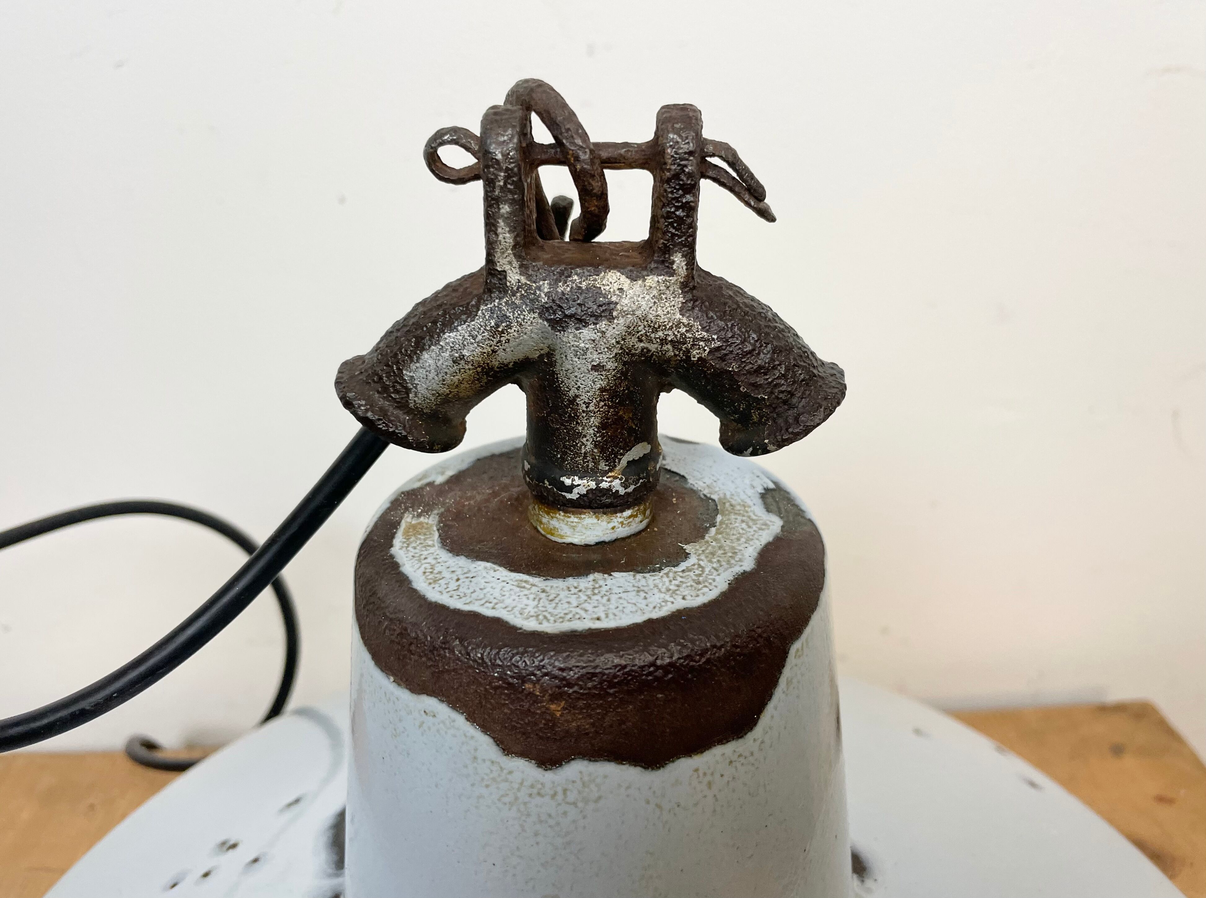 Industrial light grey enamel factory lamp with cast iron top, 1950s