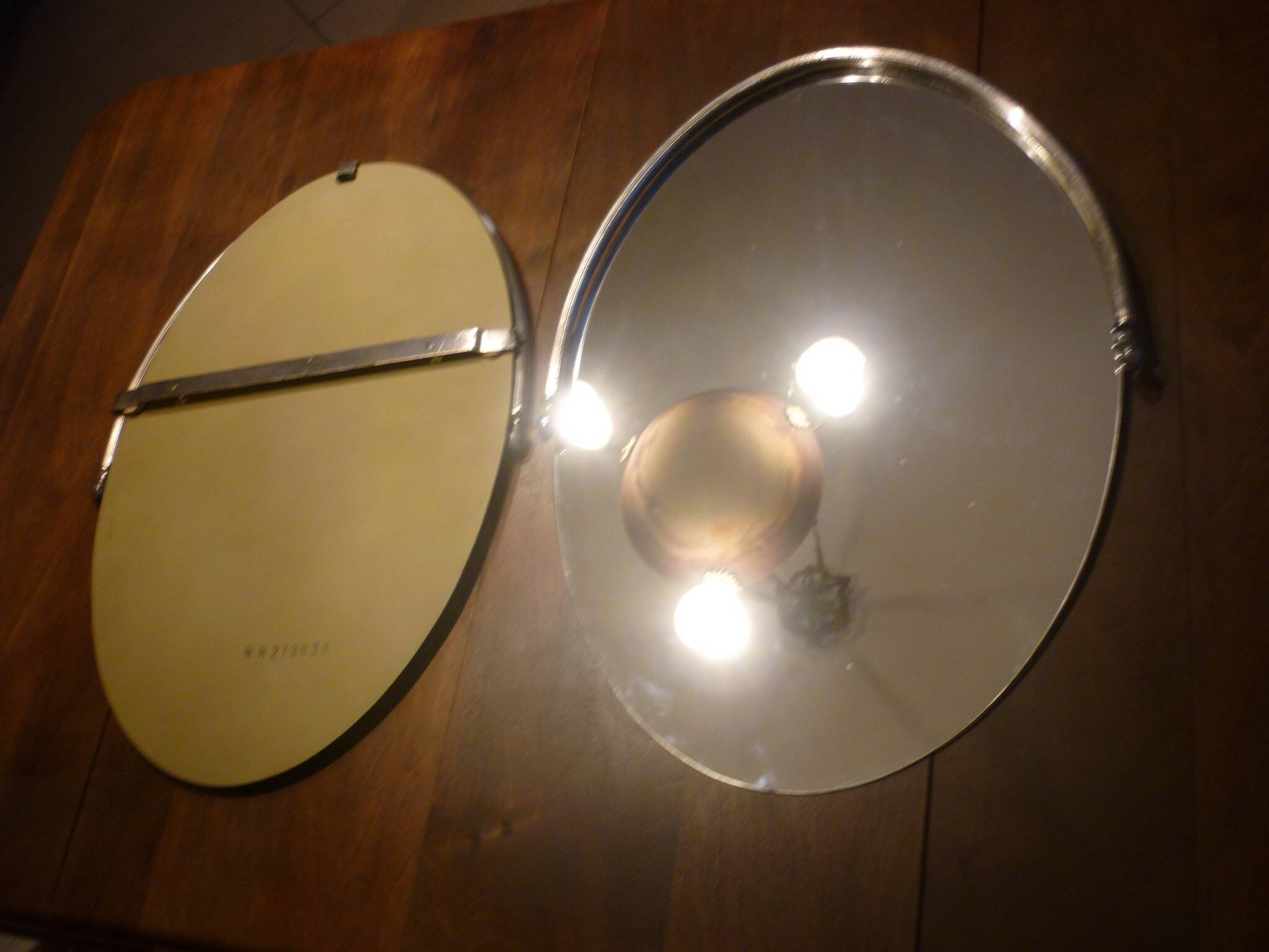 2 bathroom mirrors in silver oval holders