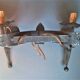 Applies two fires and fleur-de-lys in hammered wrought iron and patina in the old way in the medieval taste