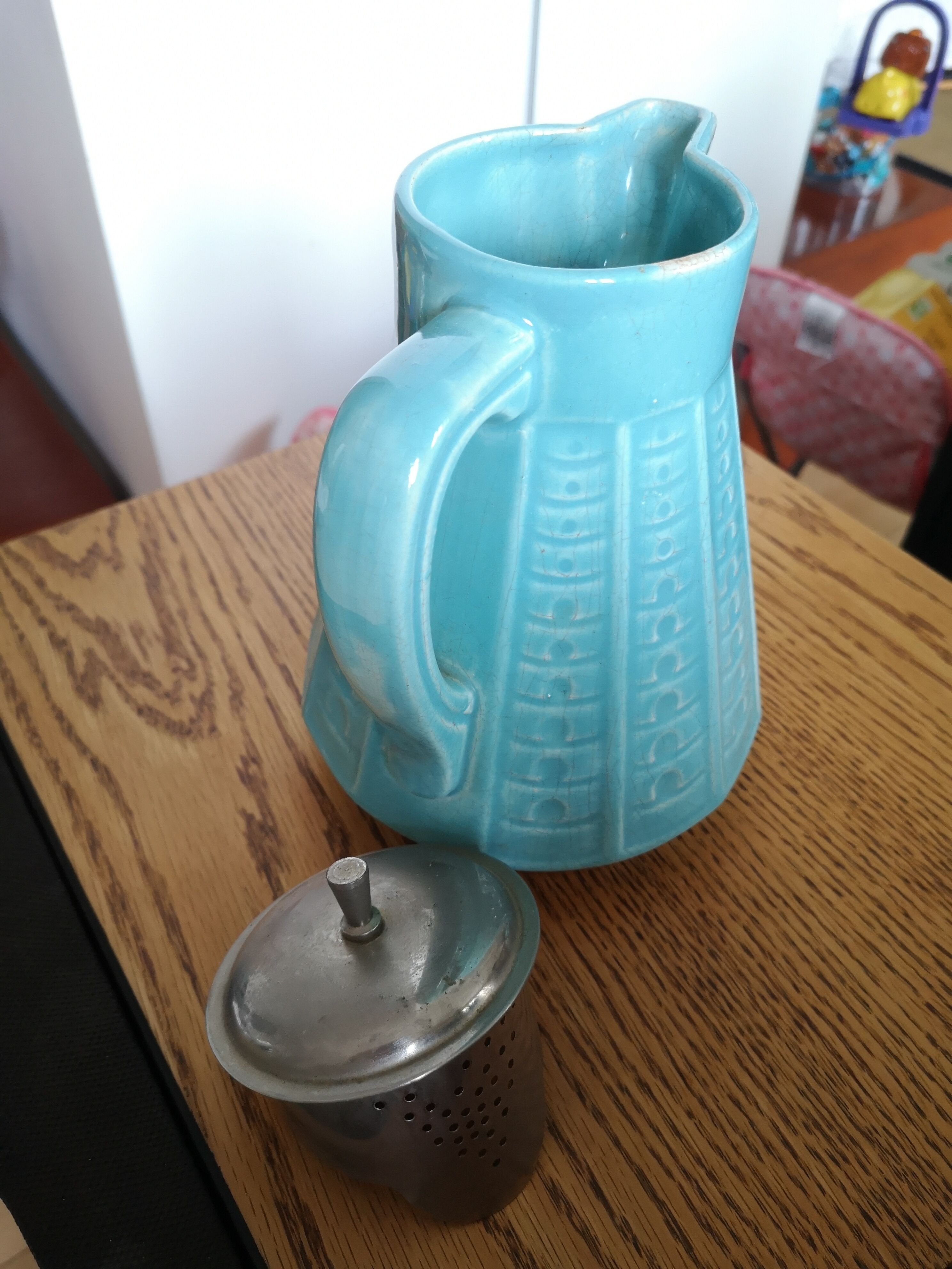 Vintage pitcher in blue ceramic and metal pourer