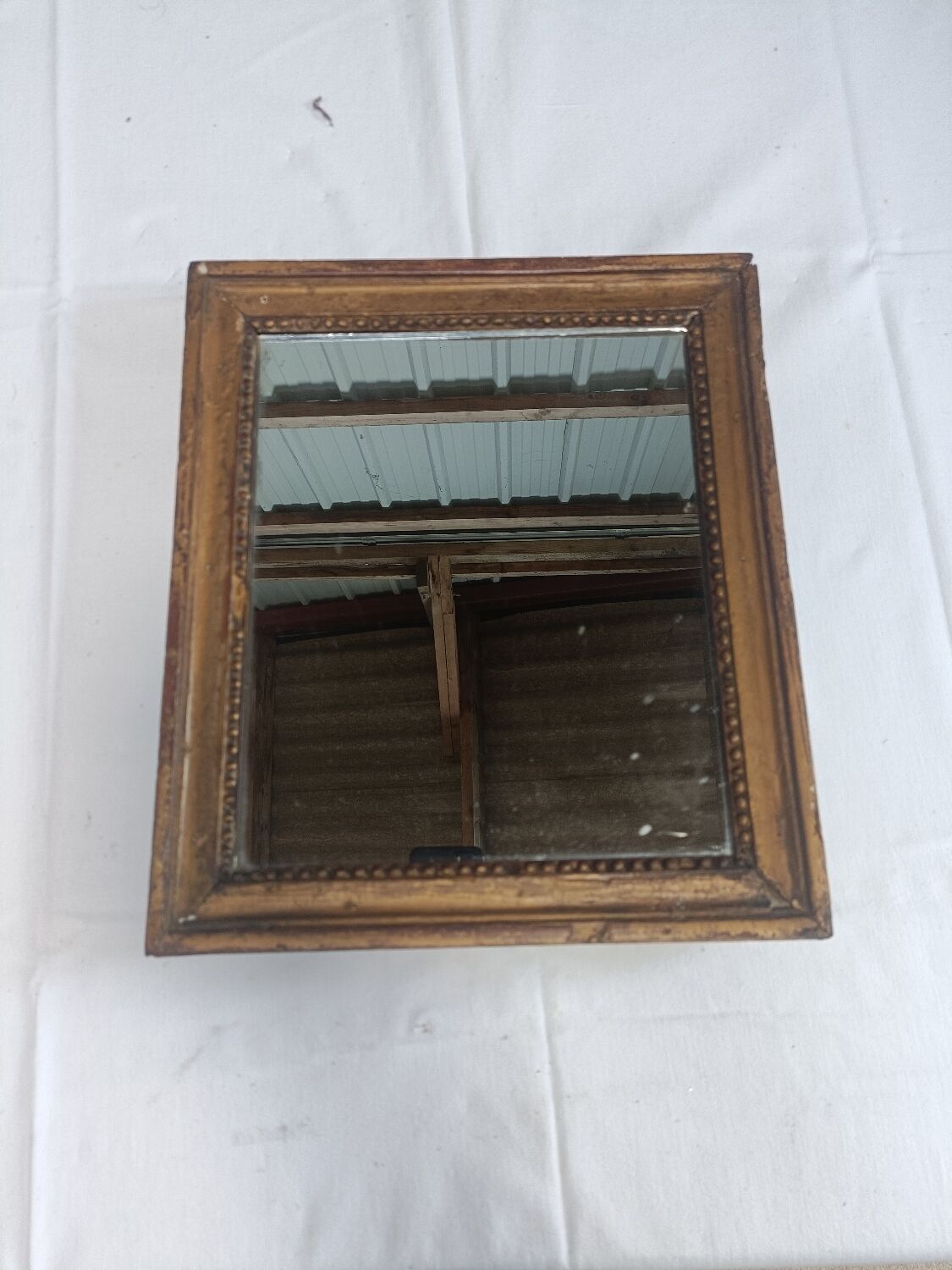 Small mirror in carved stucco wood, nineteenth, original ice