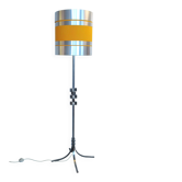 Floor lamp with a large orange shade and metal from the 1960s.