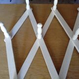 Accordion coat holder