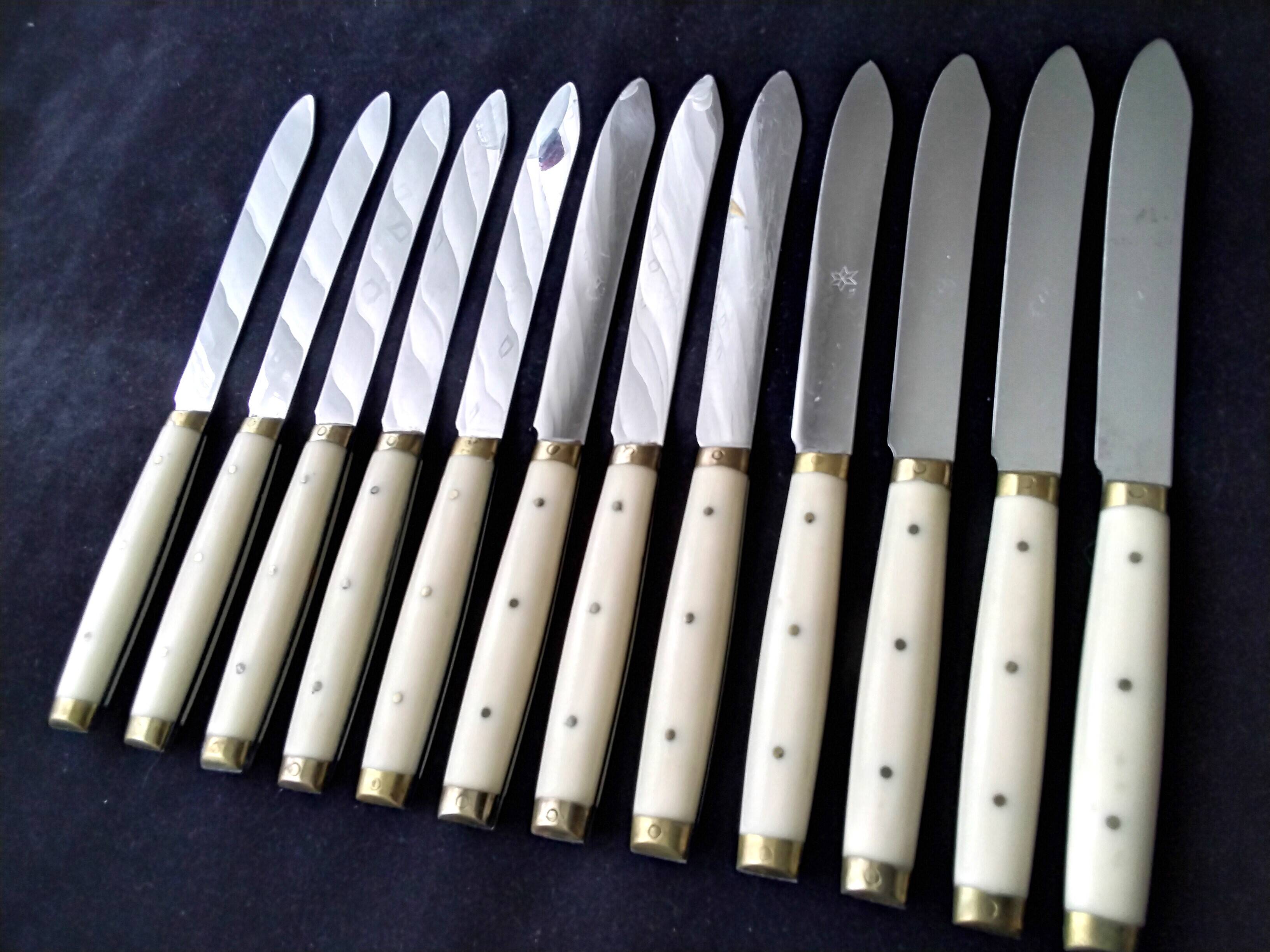 12 vintage bakelite brass and stainless steel table knives