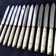 12 vintage bakelite brass and stainless steel table knives