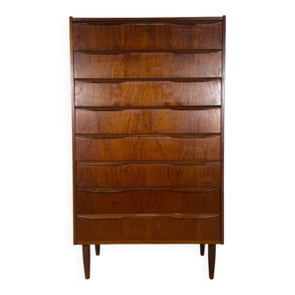 Mid-century Danish high chest of drawers with eight teak drawers.