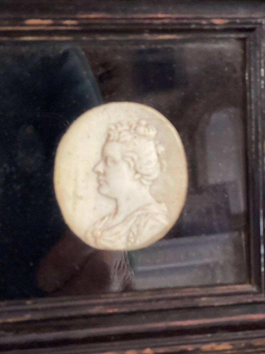 Sculpted ivory portrait suite, England circa 1880, sold in accordance with CITES regulations.