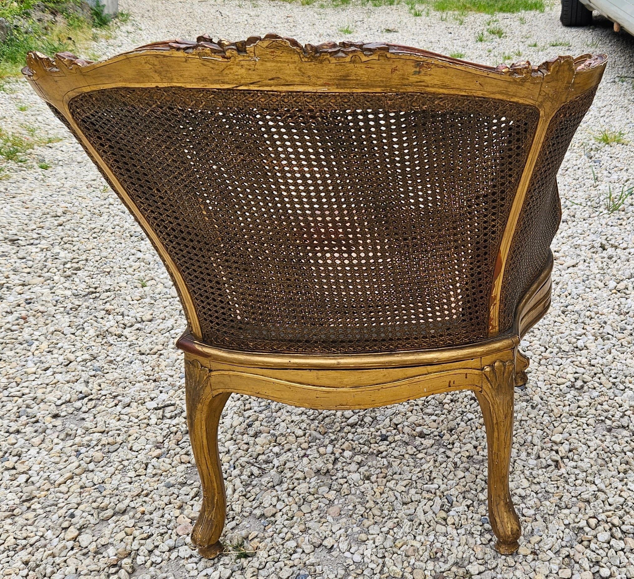Gilded wood armchair and double canning