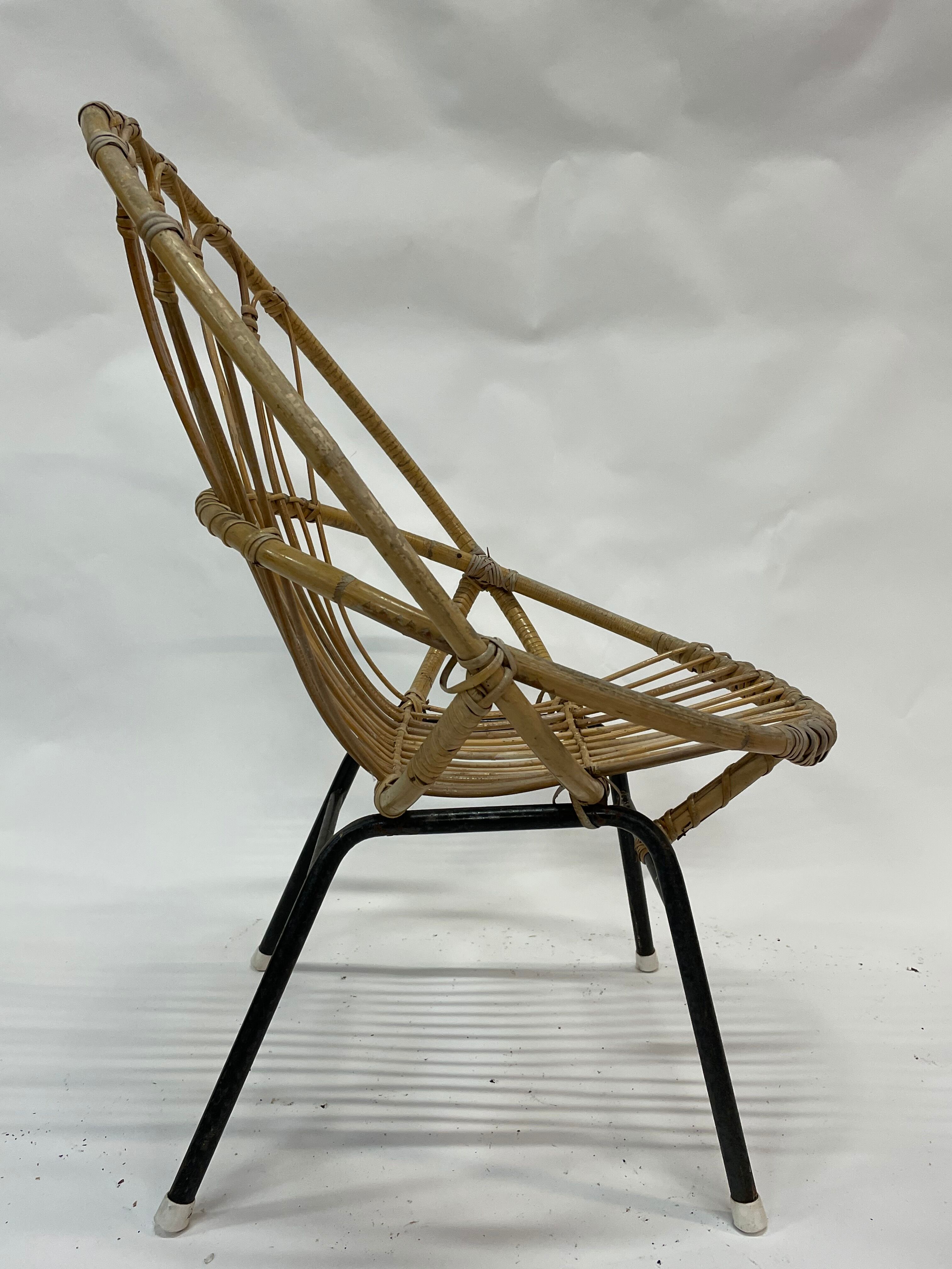 Vintage rattan chair by Dirk van Sliedregt Rohe Noordwolde 1960 in the Netherlands