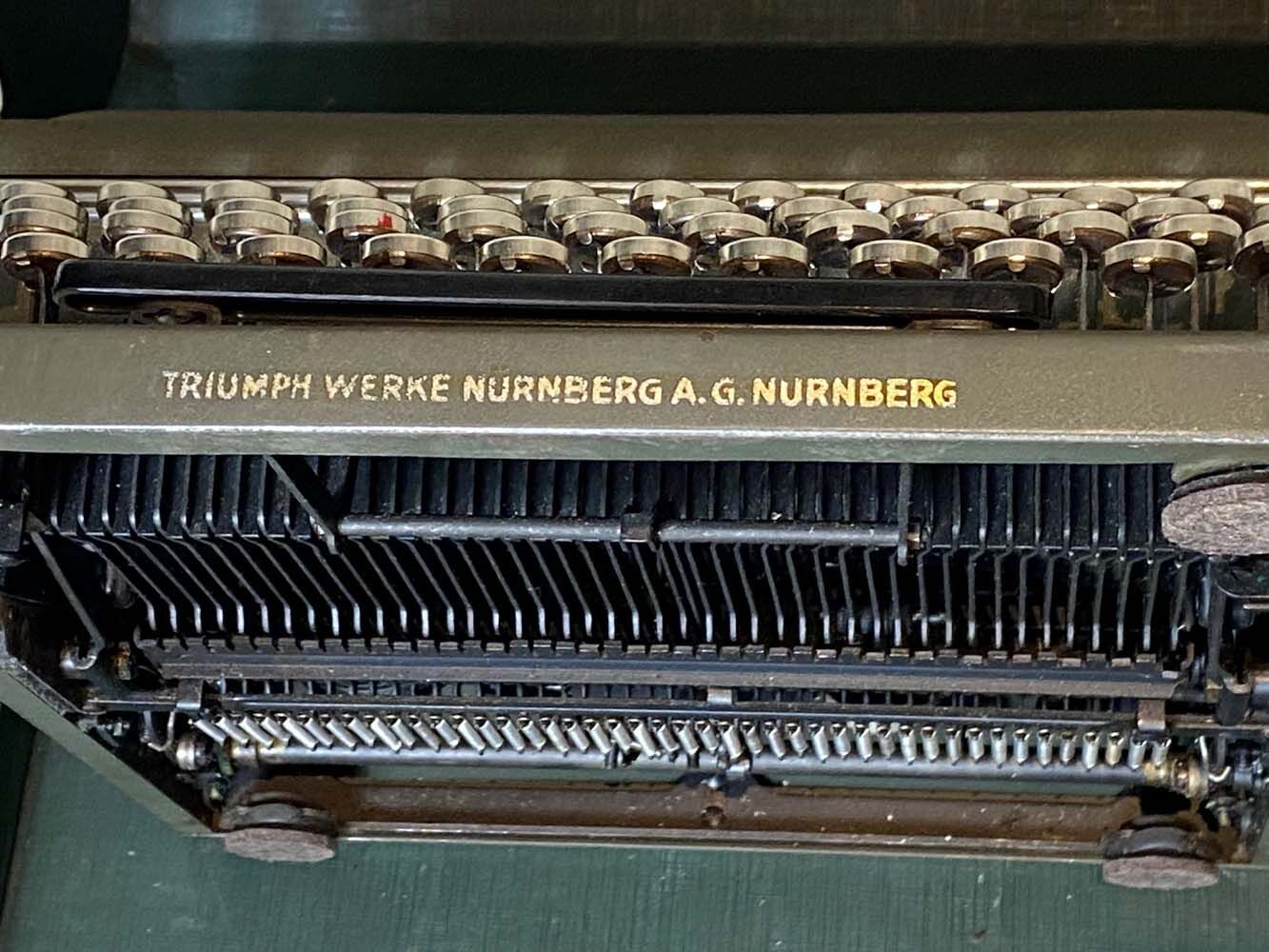 Triumph perfekt typewriter with its transport box.