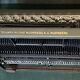 Triumph perfekt typewriter with its transport box.