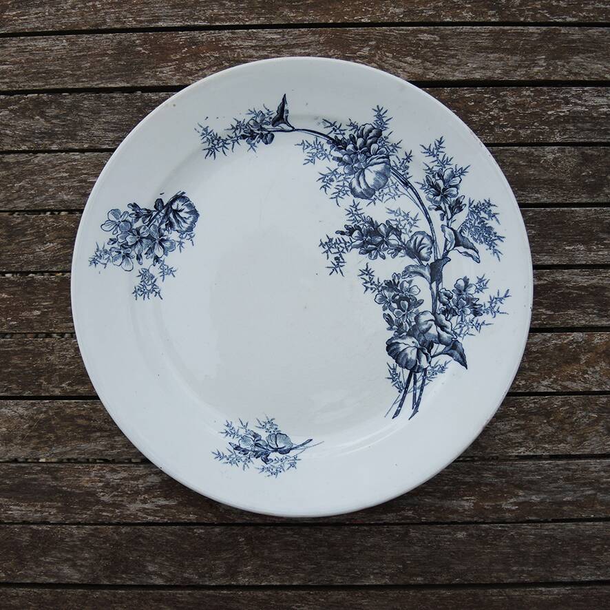 Old ironstone dish with blue floral decoration