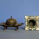 Antique carved bronze candlestick
