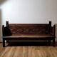 Antique carved solid wood bench from the early 20th century