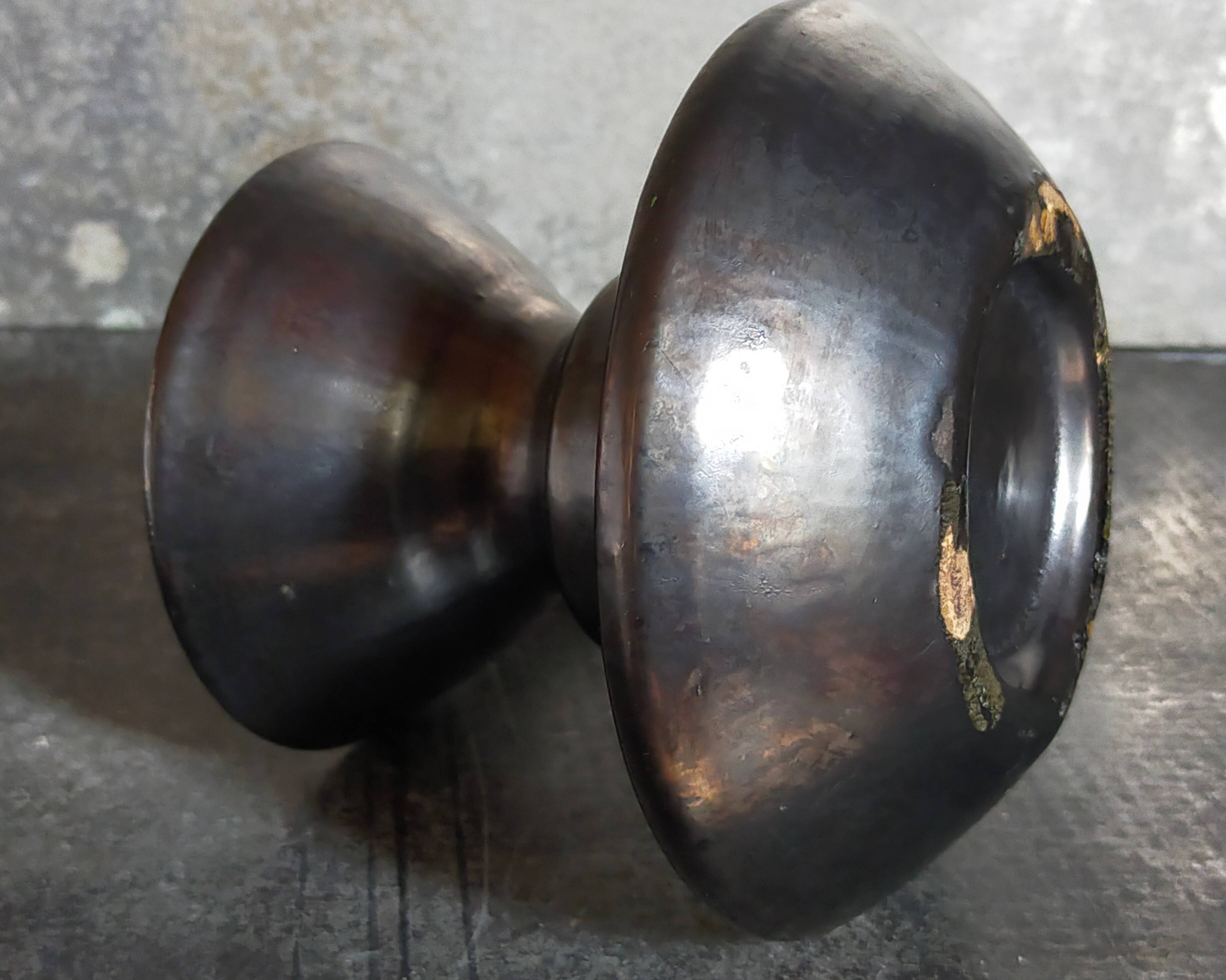 1950s iridescent black ceramic hand candle holder