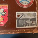Old travel suitcase and legendary stickers, 1920