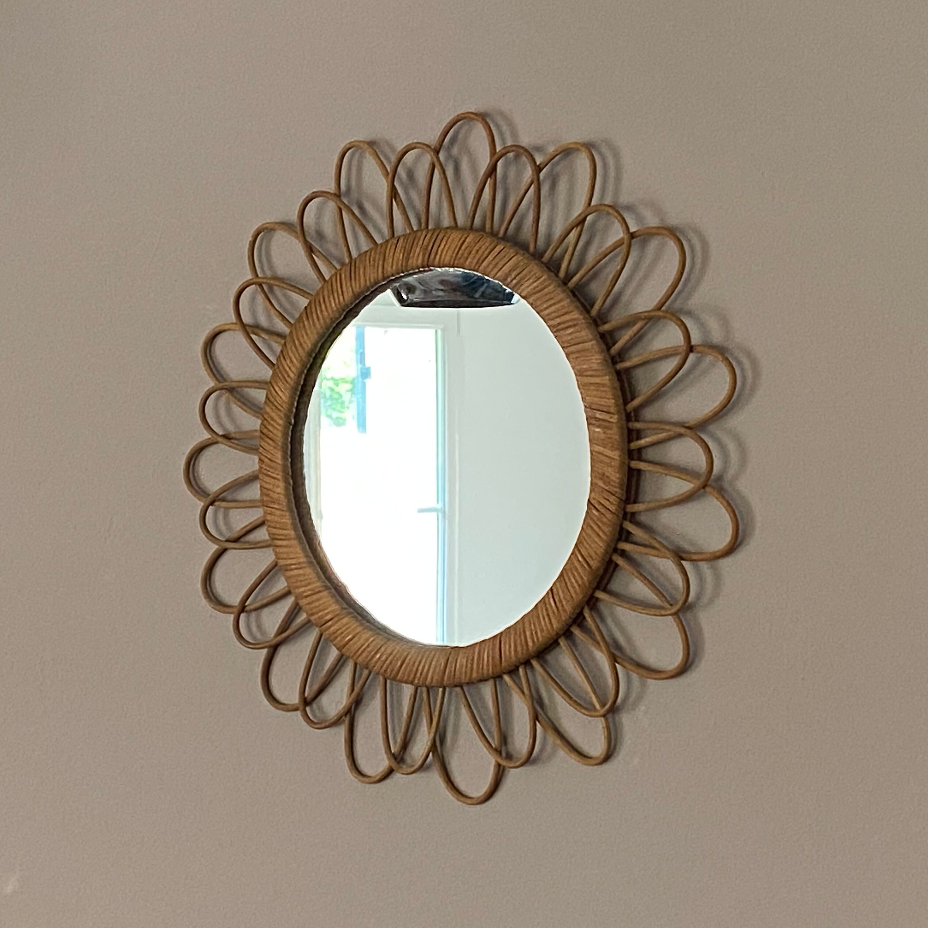 Mirror sun in rattan arched. 52cm. 1960