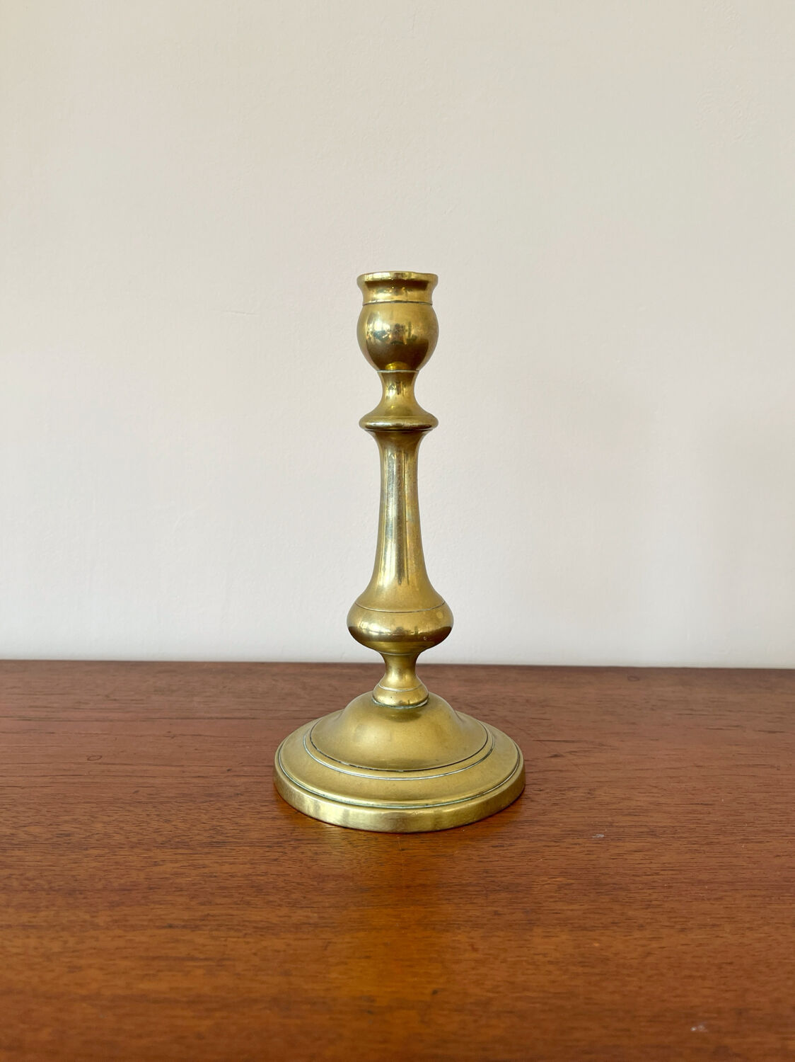 Vintage baluster-shaped antique brass candlestick