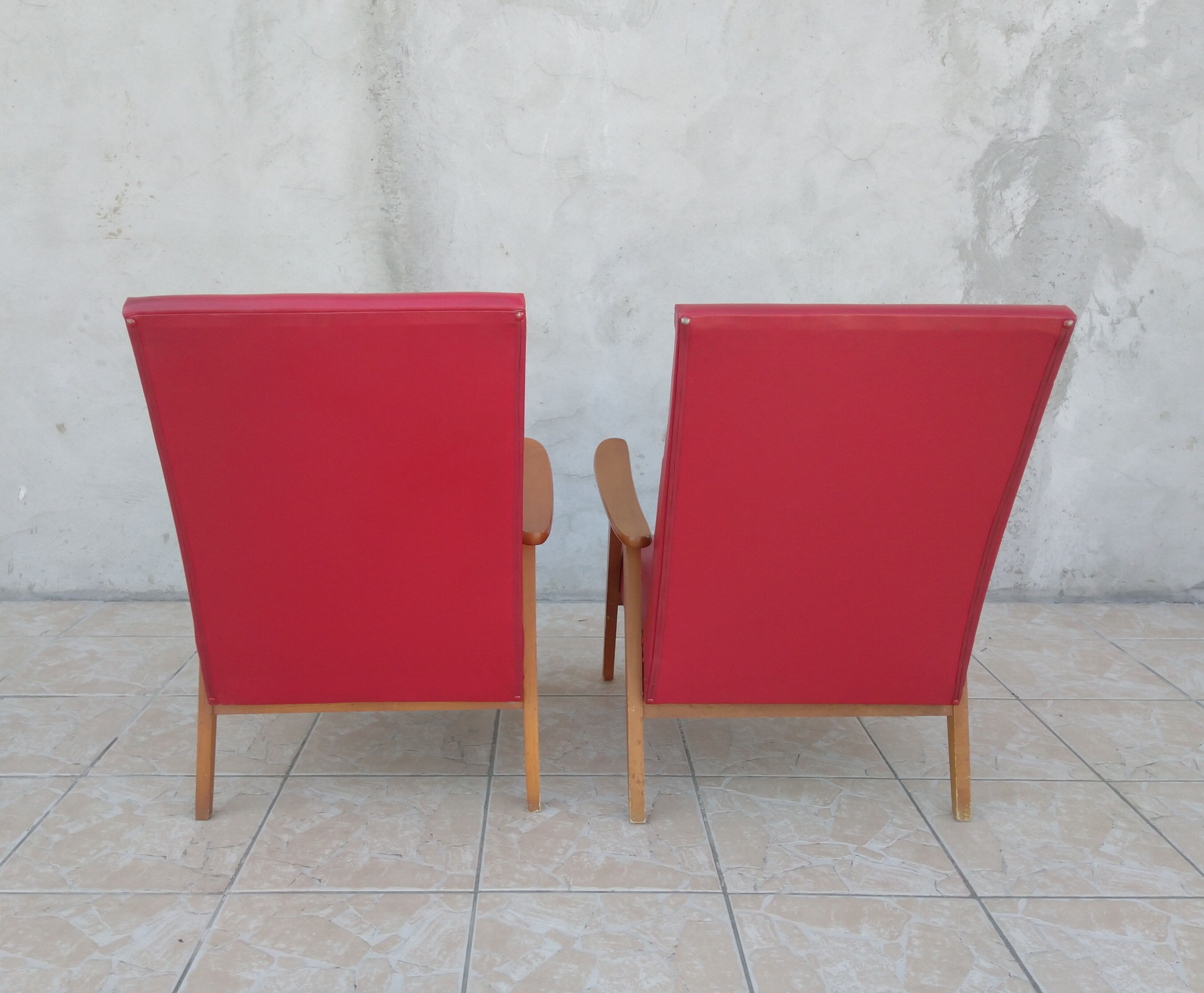 Paire de fauteuils vintage en skaï