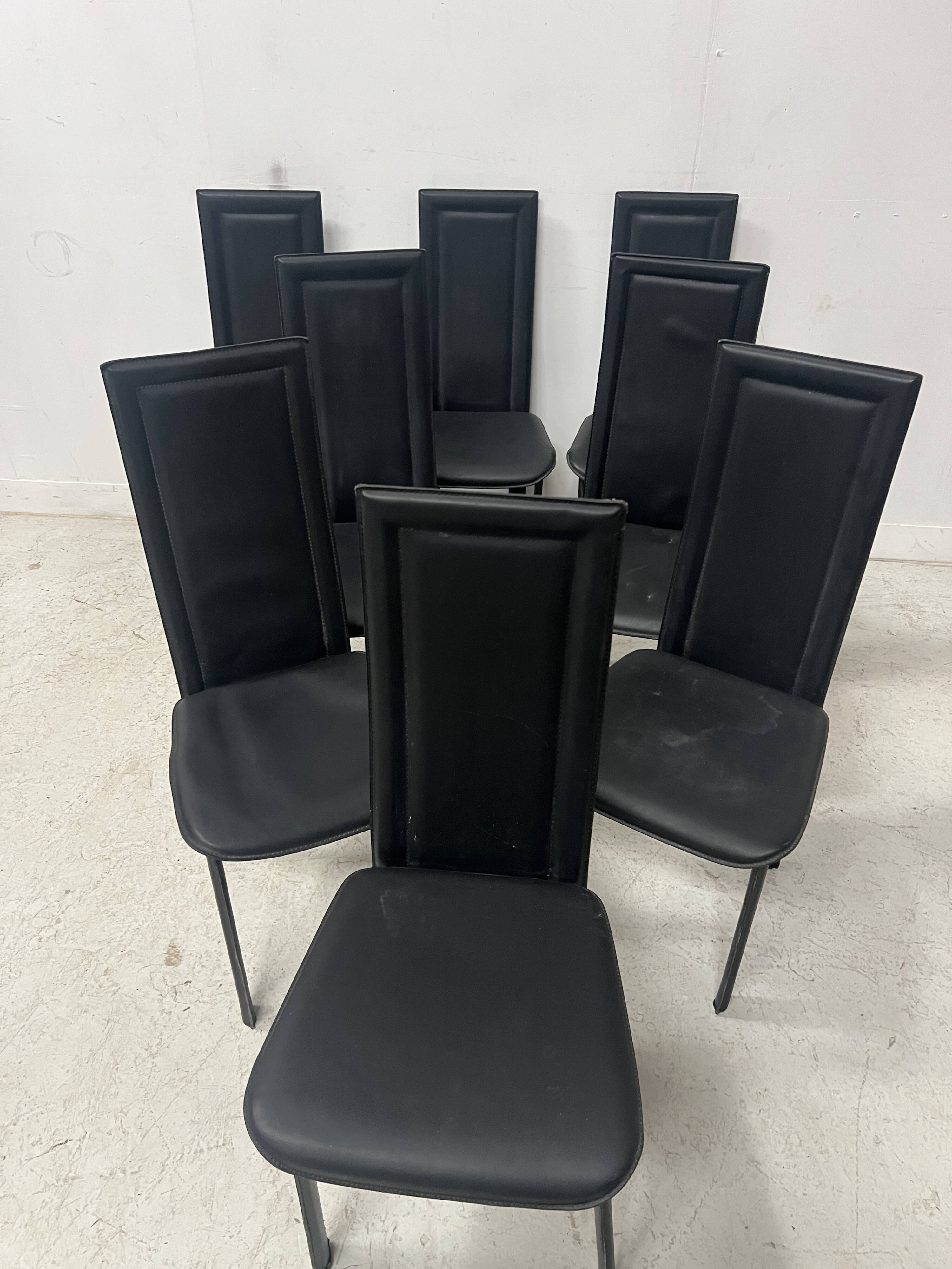Set of eight designer chairs in black leather from the 20th century