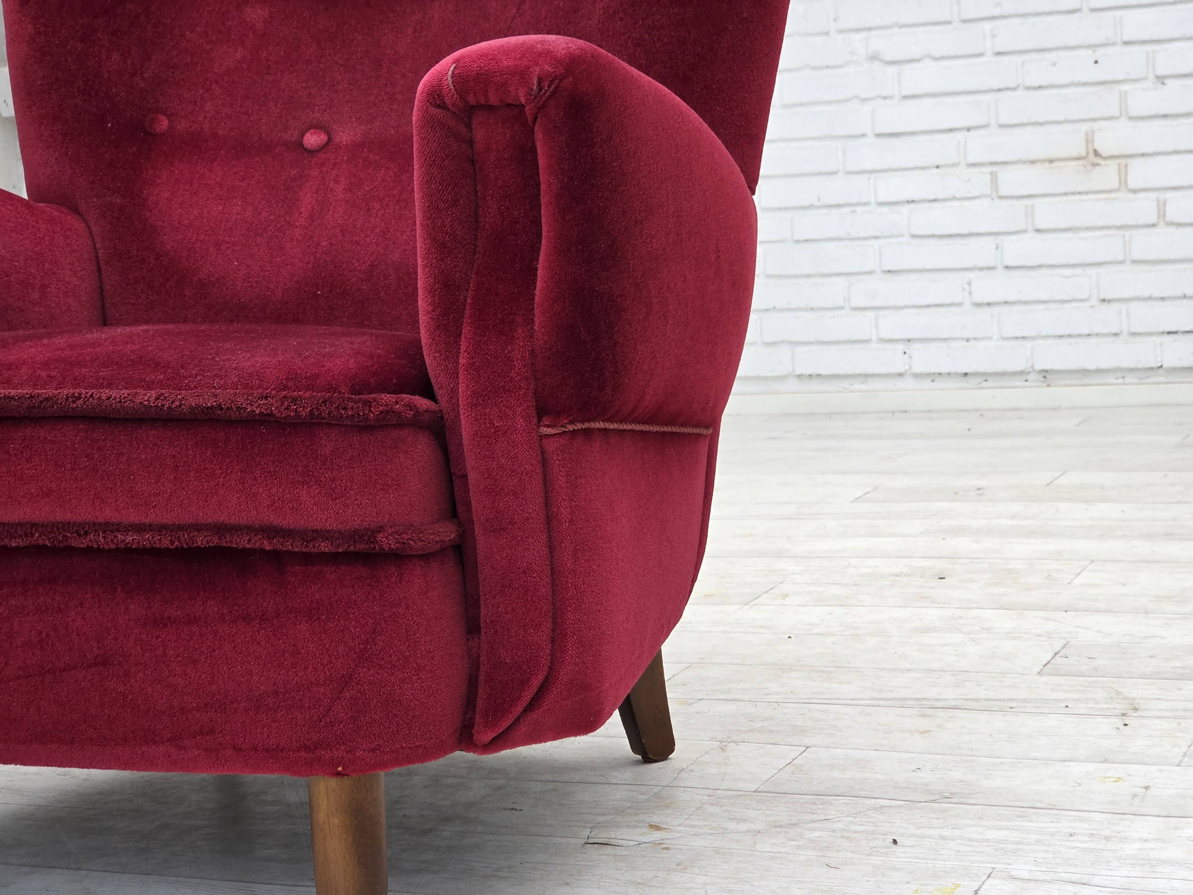 1960s, Danish armchair, cherry-red furniture velour, beech wood legs.