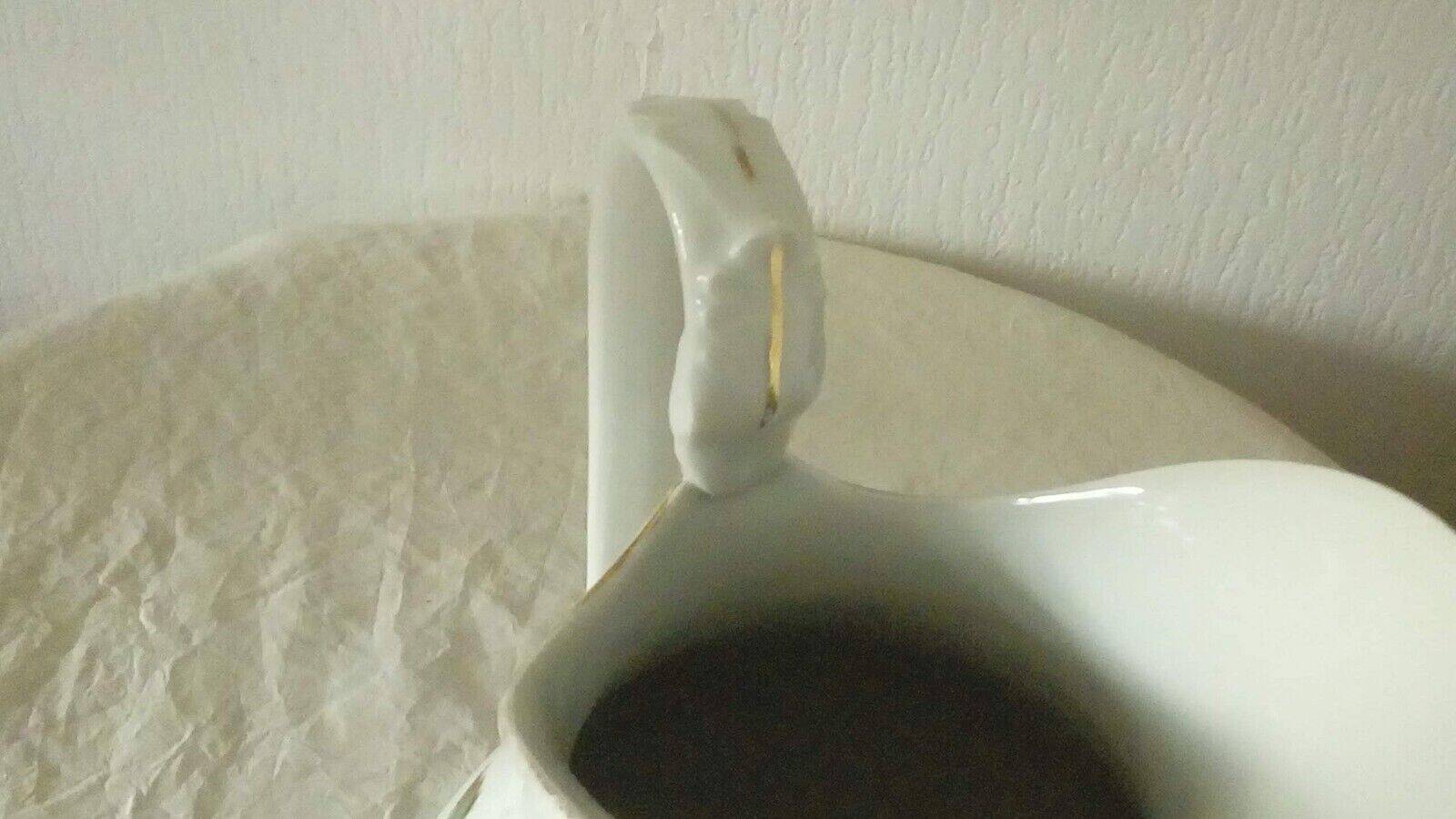 Swan neck porcelain water pitcher