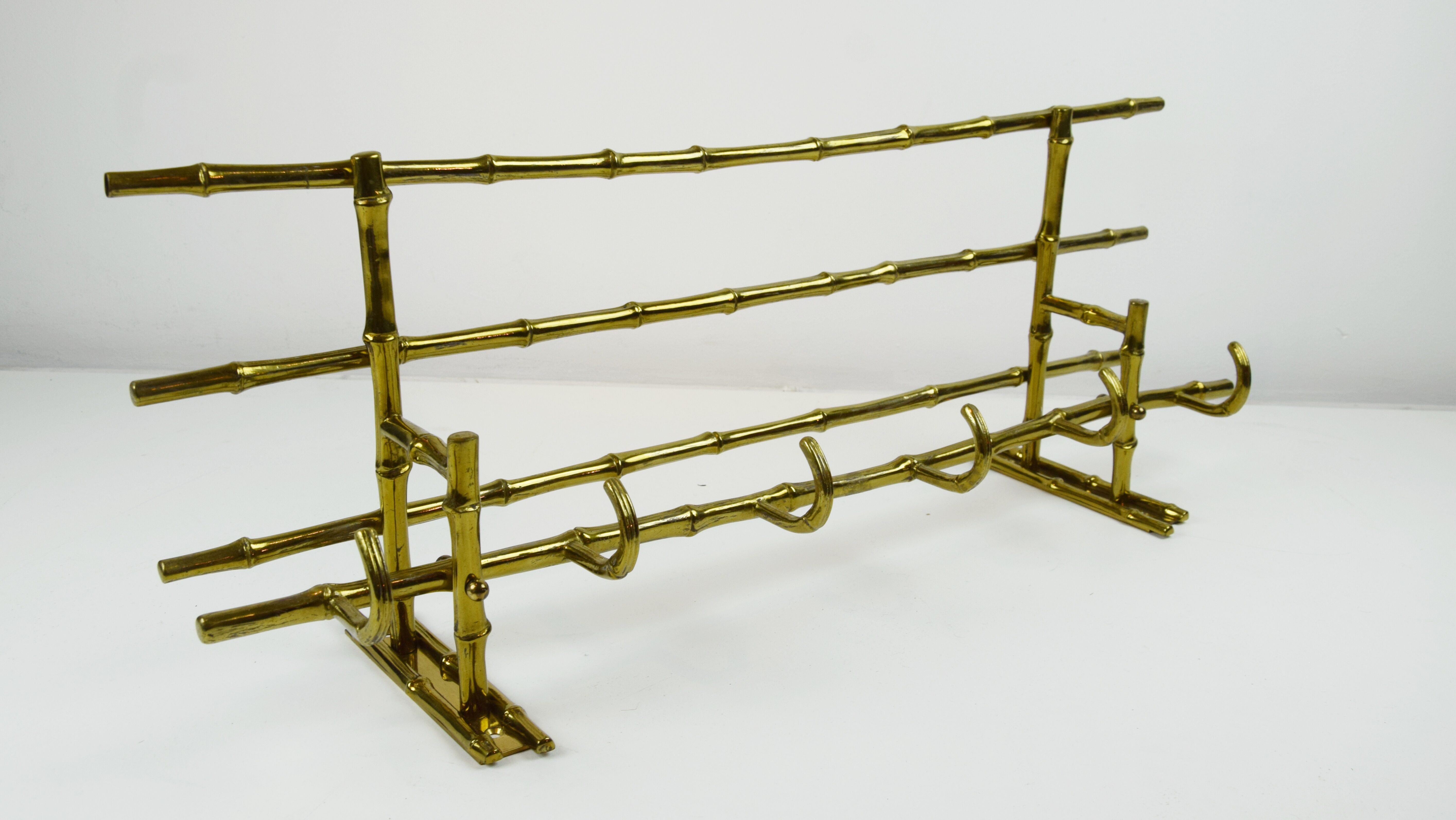 Bamboo-like coat rack in bronze