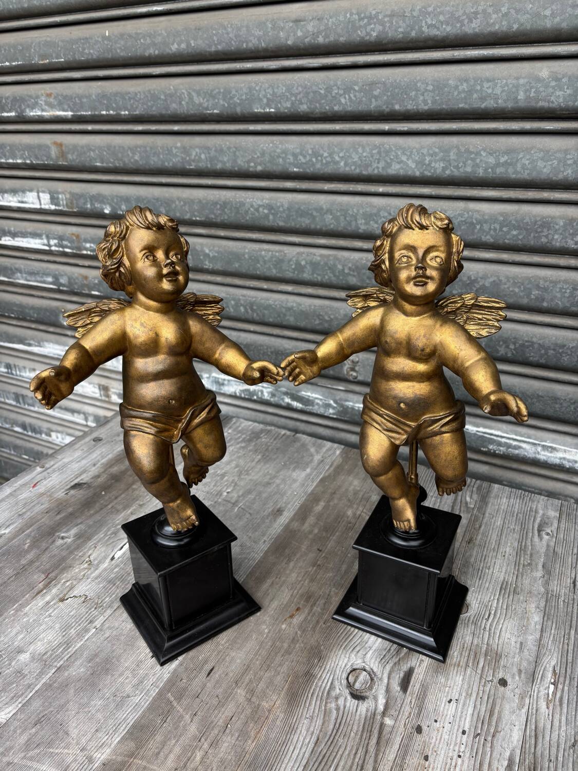 Pair of gilded cherubs on a Napoléon III base
