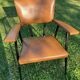 Rare fauteuil en skaï marron clair, de "Colette Gueden" , designer des années 50
