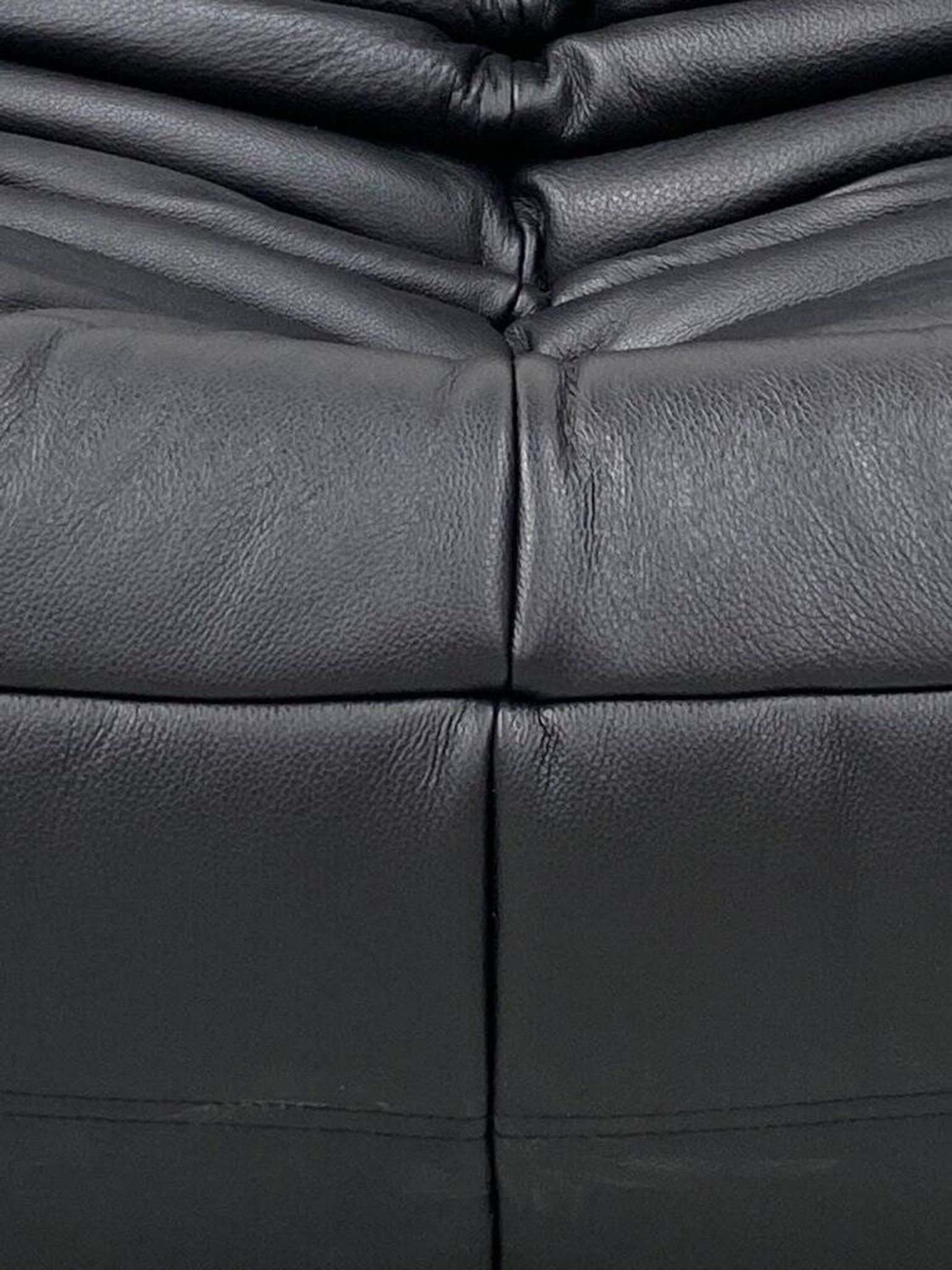 Togo lounge chairs in black leather attributed to Michel Ducaroy for Ligne Roset, set of 2