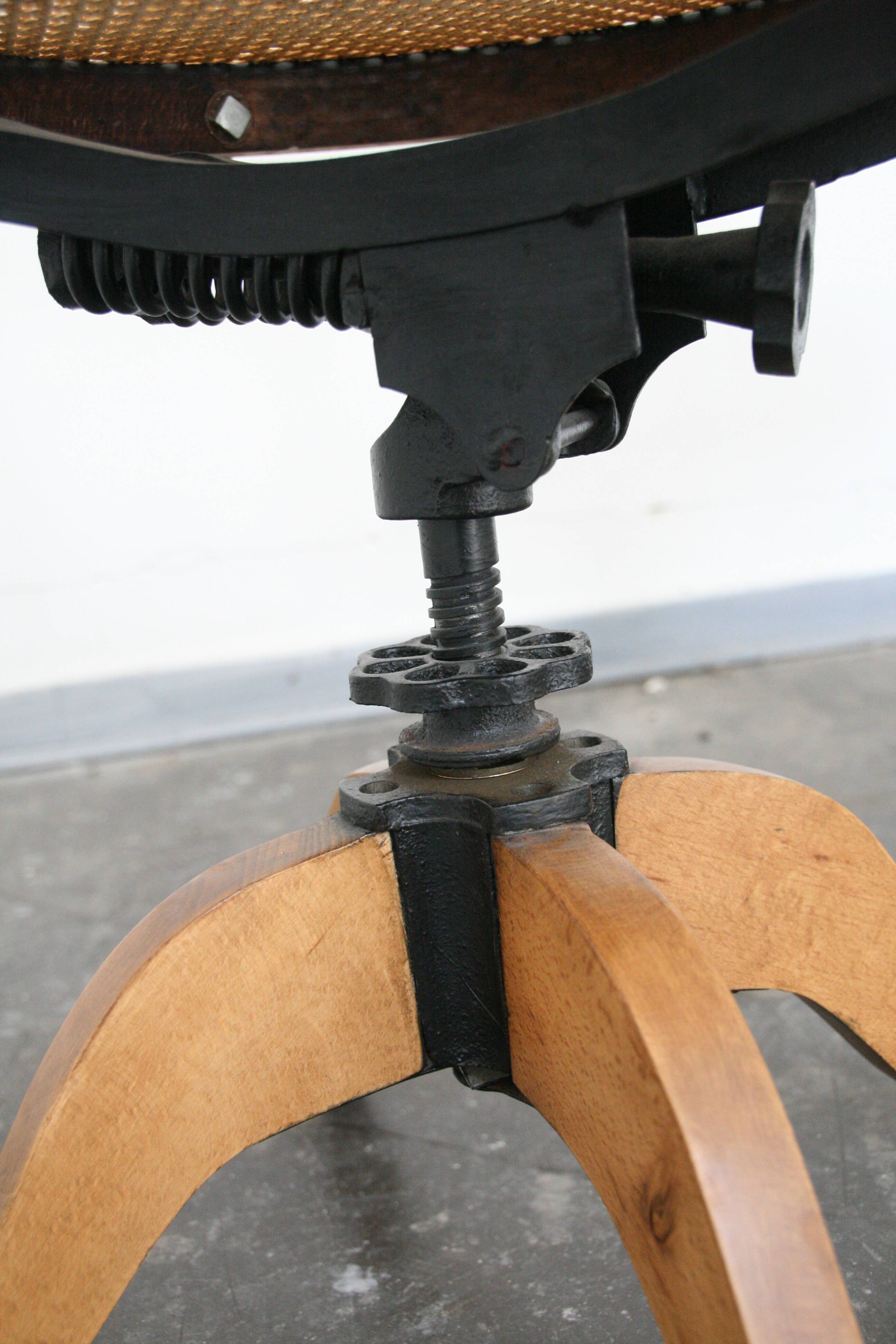 A pair of vintage bent wood svivel chairs by Salvaatore Leone Italy